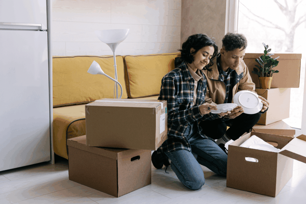 couple unpacking at their new home