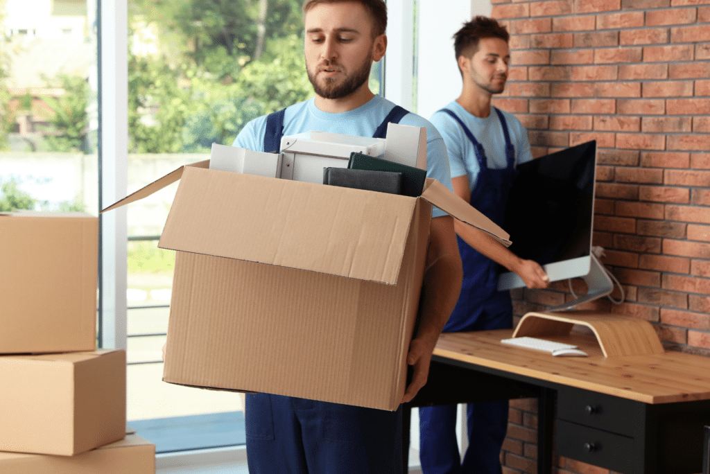 movers helping to move and pack an office